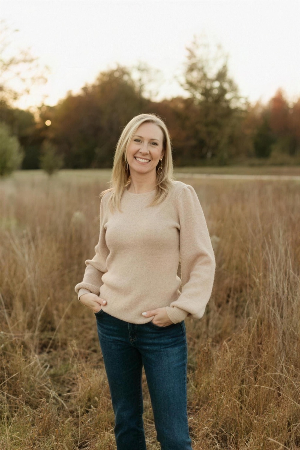 Dr. Valerie McCullough standing in a field